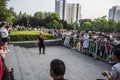 A 70-year-old grandmother sang Teresa TangÃ¢â¬â¢s song at Xuanwumen Square to attract a large number of people to watch